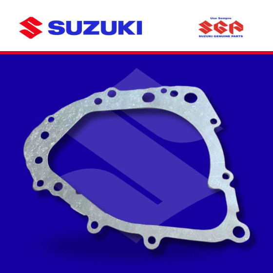 EMPAQUE TAPA IZQ./CORONILLA AX4 (SUZ)