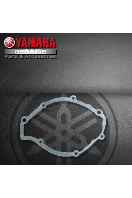 EMPAQUE TAPA IZQ./ CORONILLA YAMAHA YBR125 (SUZ)